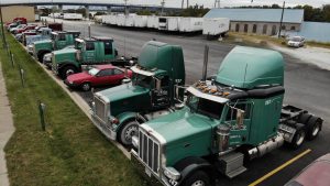 Trucks parked in parking lot.