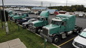 Trucks parked in parking lot.